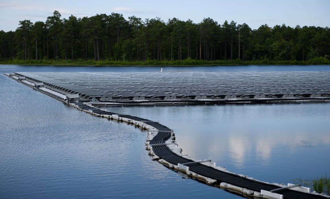 A floating solar panel system constructed on top of a lake in Aberdeen, North Carolina. (Photo by Melissa Sue Gerrits/Getty Images)