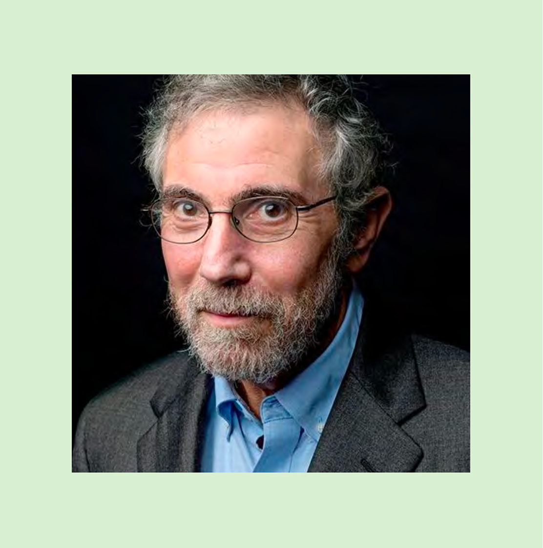 A middle-aged man with gray hair, a beard, and glasses, wearing a blue shirt and a dark blazer, is shown against a black background with a pale green border around the photo.