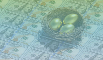 A bird’s nest holding three golden eggs sits on top of several one hundred dollar bills spread out as a background.