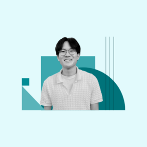 A smiling person wearing glasses and a textured white shirt stands in front of geometric teal shapes on a light blue background.